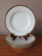 4 ASSIETTES CREUSES  23 CM  PORCELAINE DE LIMOGES LISERES DORE DESHOULIERES