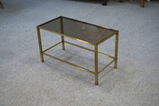 Table basse en laiton et verre