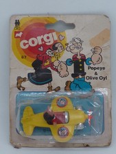 ANCIENNE FIGURINE METAL ET P¨LASTIQUE CORGI TOYS POPEYE * OLIVE EN AVION