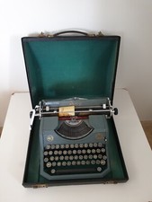 Ancienne machine à écrire Rooy Unis 40 dans étui rigide