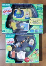 Console VIDEO VISION 4 jeux interactifs GOGO TV de Smoby + boîte jeu supplément.