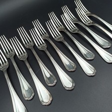 CHRISTOFLE - 12 FOURCHETTES DE TABLE EN MÉTAL ARGENTÉ Modèle SPATOURS 