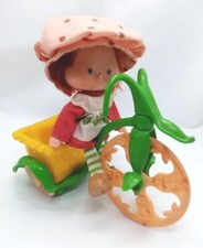 Poupée vintage Charlotte aux fraises et Son Tricycle STRAWBERRY Shortcake  1979