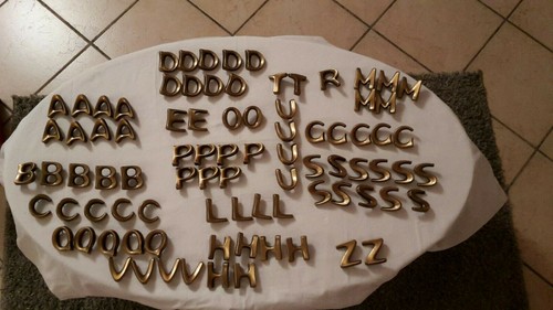 Lot lettres bronze pour - en,