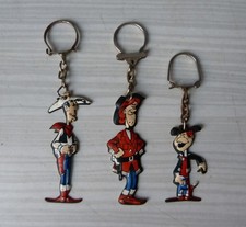 #Porte-clés BD# OMO (Lessive) Lucky Luke, Calamity Jane, Billy the Kid