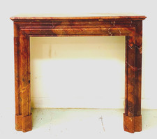 cheminée boudin époque Louis Philippe en marbre brèche sanguine . XIX siècle .