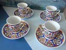 4 tasses à café et sous