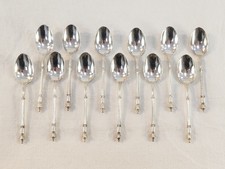 12 petites cuilleres a moka en ARGENT MASSIF HENIN et CIE