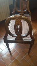 Banquette en bois mouluré sculpté doré style louis XVI avec assise cannée