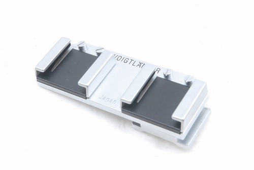 Adaptateur double chaussure