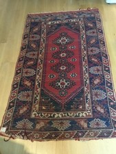 Grand tapis oriental en laine 