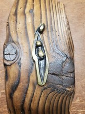 Ancien petit bronze sur bois