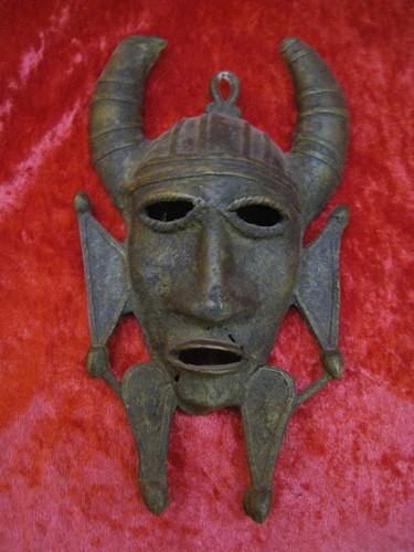 Masque bronze origine - en,