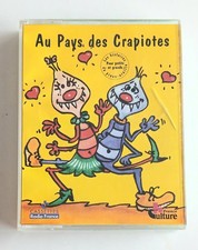 Coffret 2 Cassettes Audio – Au Pays des Crapiotes – 1995 – Bon état – Radio FR