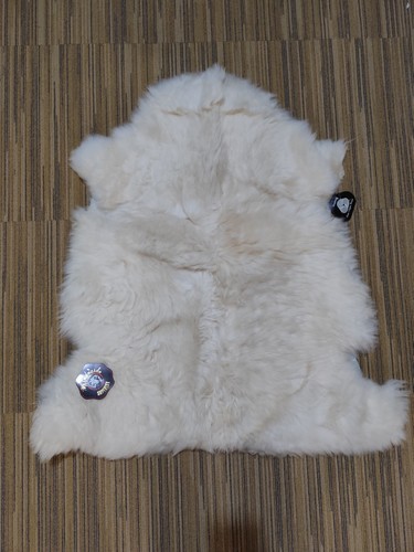 Peau mouton pure laine - -,