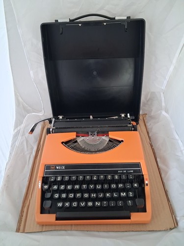 Machine écrire orange - à,