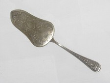 08J22 ANCIENNE PELLE A GATEAU