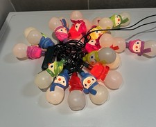 Ancienne Guirlande électrique forme Pères Noël. Vintage.