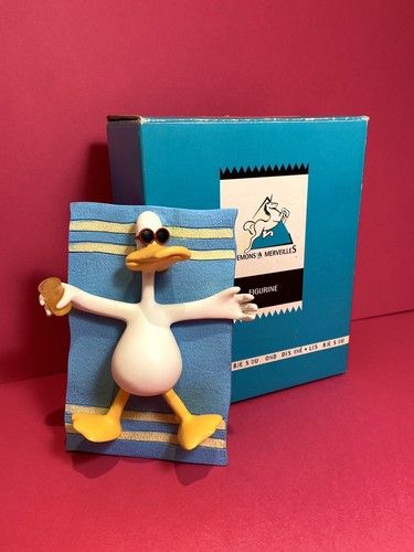 Figurine duck sitting - sitting, démons
