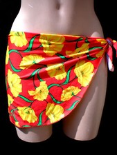 PAREO JUPETTE DE BAIN OPAQUE FLEURS JAUNE/VERT/ROUGE.