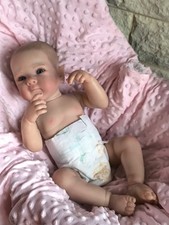 Petit garçon de 50cm entièrement en vinyle siliconé