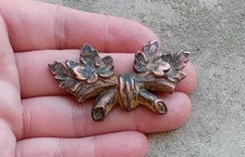 Ancien élément décoration en métal rouge pour meubles, pendule...N°63C