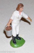 Fermière portant un sceau