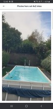 piscine hors sol  INTEX 4X2. Bon état avec tous ses accessoires et bâche. 