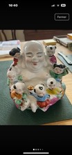 ancien bouddha rieur avec enfants en  porcelaine