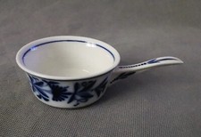 Poêlon en porcelaine de Bayeux décor de marguerites