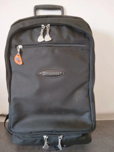 Sac dos - sac, à