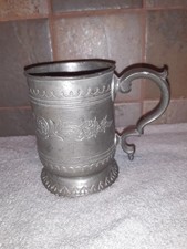 Tasse ancienne en étain