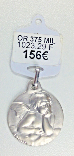 Médaille massive neuve