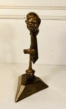 Dans le goût d’Yves Lohé. Le trompettiste. Sculpture en bronze à patine brune.