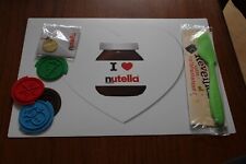 LOT NUTELLA NEUF / SET DE TABLE - SPATULE - TAMPON BISCUIT - MEDAILLE / FERERRO