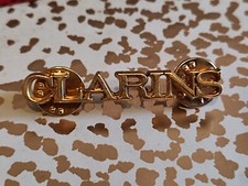 Pin's parfum CLARINS