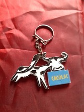 porte clé publicitaire CACOLAC vache