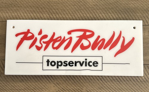 Pistenbully top service - top, sign
