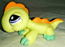 lézard jaune vert orange yeux