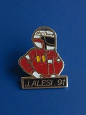Pin's publicitaire ancien