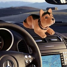 Chien pendulaire voiture remue
