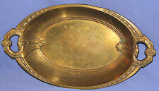 Ancien plat en laiton orné