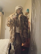 Manteau en véritable fourrure renard