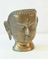 Tête asiatique en laiton des