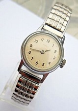 ANCIENNE TIMEX MÉCANIQUE DAME DES SEVENTIES,EXCELLENTES FONCTIONS,BRACELET NEUF 