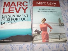 LOT DE 2 LIVRES MARC LEVY- GRAND FORMAT