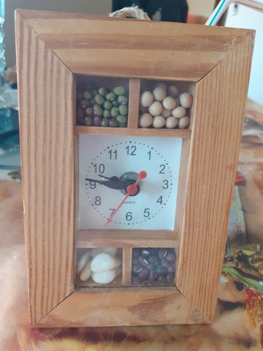 Pendule bois décoré - , avec