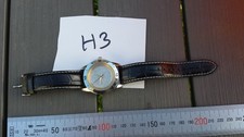 H3/ Ancienne montre bracelet STAINLESS STEEL  ANNIVERSAIRE DU NOUVEAU FRANC