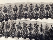 Dentelle ancienne noire de