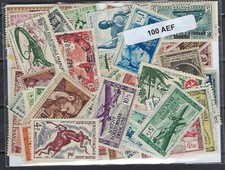 Afrique Equatoriale Française - AEF 100 timbres différents neufs et oblitérés